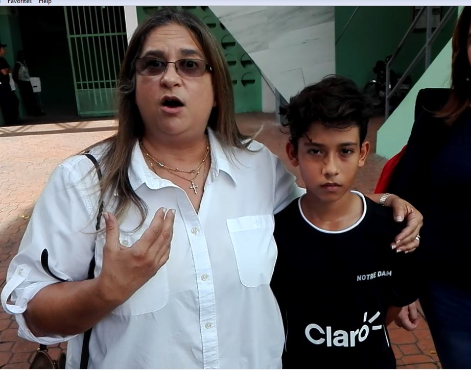 Maria L. Rodríguez, directora del Colegion Notre Dame, junto a Sebastián Joseph.