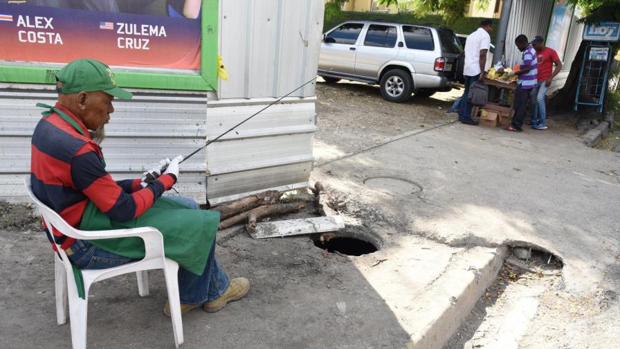 Un madero alerta en medio del agujero