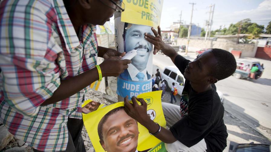 Divididos y azotados por huracán, haitianos van a las urnas  