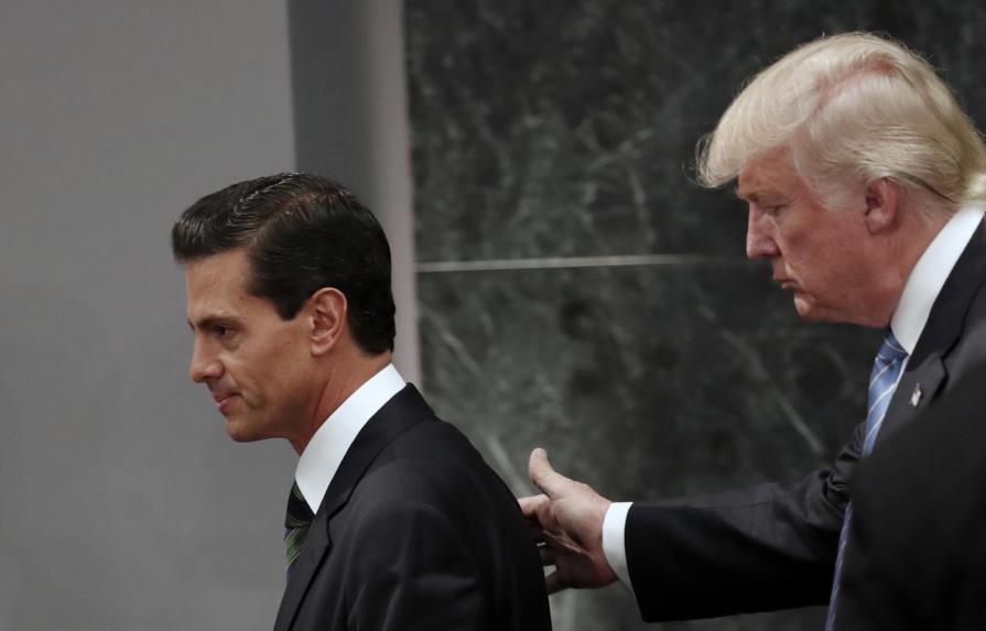 Trump y Peña Nieto acuerdan renegociar acuerdo comercial entre México, Estados Unidos y Canadá