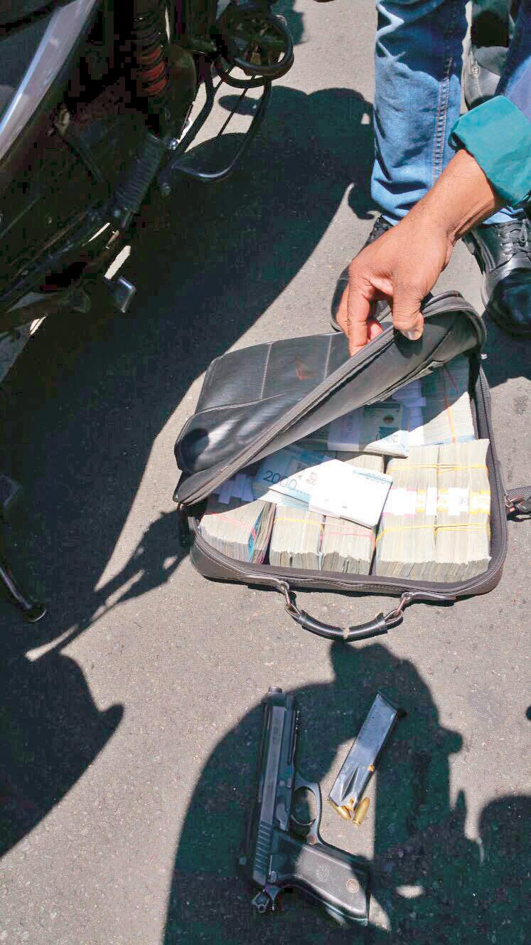Mensajero llevaba US$200 mil y RD$415 mil en efectivo al ser atracado en Piantini