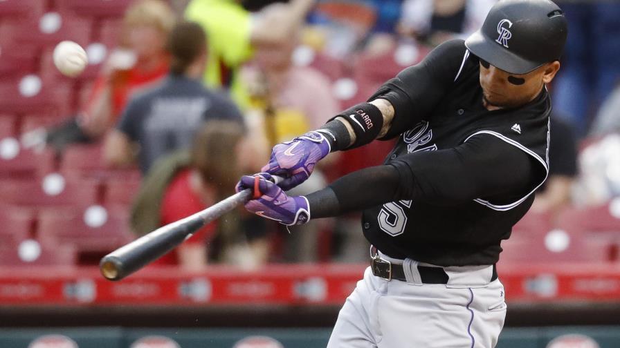 CarGo pegó su jonrón 200 con los Rockies que vencieron a Cincinnati 6-4 CarGo pegó su jonrón 200 con los Rockies que vencieron a Cincinnati 6-4