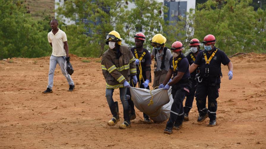 Banda de haitianos acusada de matar hombres hallados en hoyos
