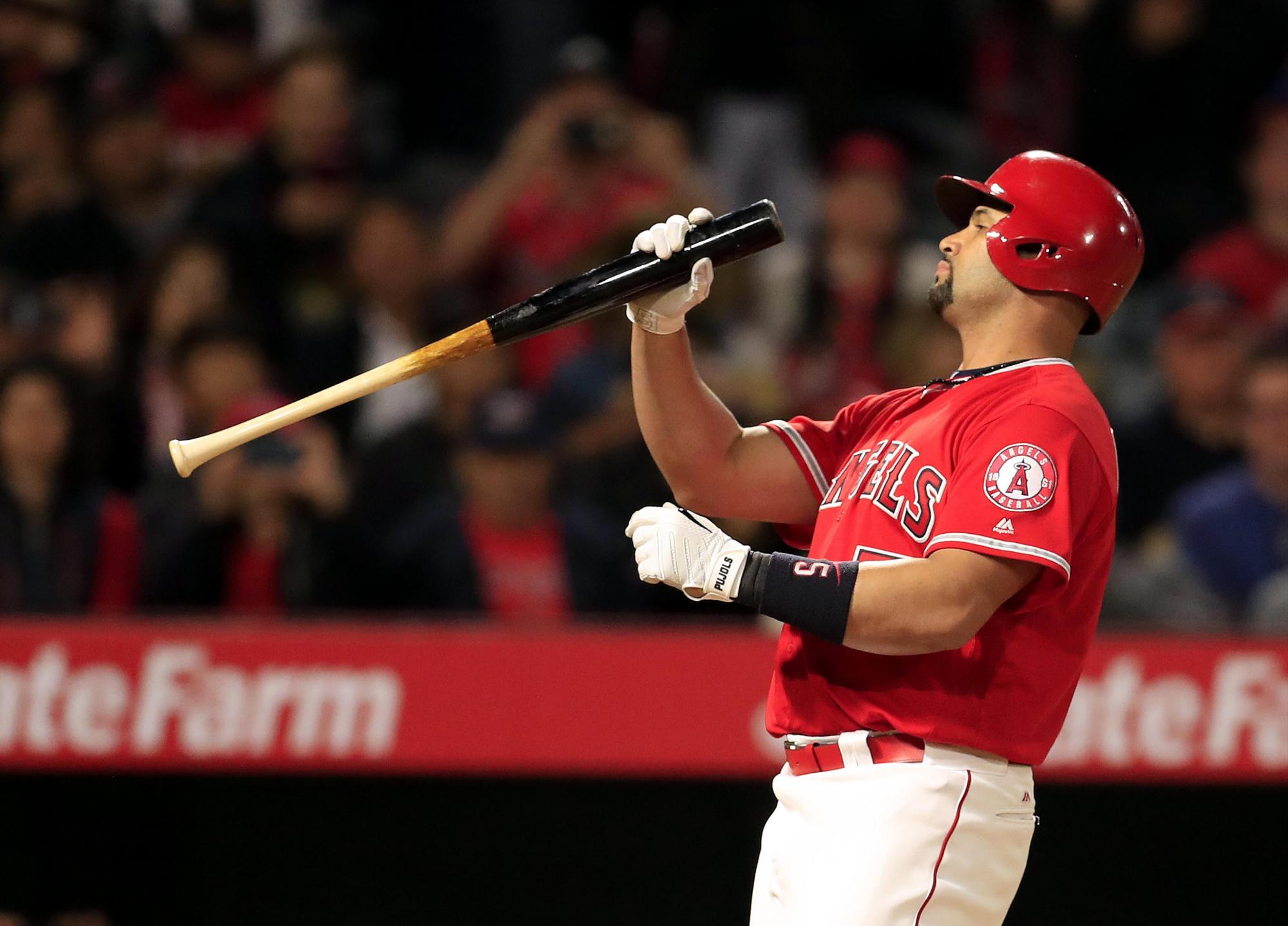 El jugador Albert Pujols, de los Ángeles de Anaheim, llegó a 600 jonrones, un cuadrangular al dominicano Ervin Santana.