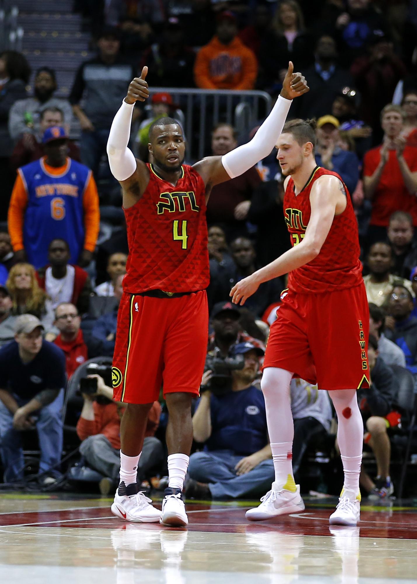 Atlanta Hawks forward Paul Millsap (4) reacts after fighting for a jump ball in the fourth overtime of an NBA basketball game against the New York Knicks, Sunday, Jan. 29, 2017, in Atlanta. The Hawks won the game in the fourth overtime. Atlanta Hawks forward Paul Millsap (4) reacts after fighting for a jump ball in the fourth overtime of an NBA basketball game against the New York Knicks, Sunday, Jan. 29, 2017, in Atlanta. The Hawks won the game in the fourth overtime.