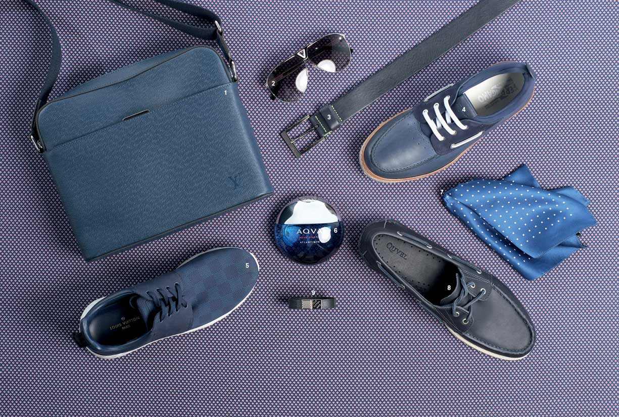 Aventurero. 1,2,5 y 9. Mail bag en piel, gafas de sol, calzado deportivo y pulsera en piel y metal, de Louis Vuitton 3 y 7. Cinturón en piel y pañuelo de seda, de Hugo Boss. 4. Zapato Náutico de piel, de Salvatore Ferragamo. 6. Perfume Aqva Atlantiqve de Bvlgari, de Senses. 8. Zapato Náutico de piel, de Quvel.