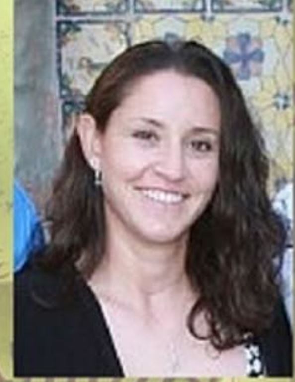 Kathleen Rodríguez, manager del combinado de la Universidad de Texas, quien dirigirá a Claudia Santana.