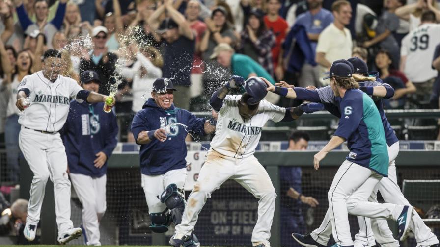 Segura anota por wild pitch y decide victoria de Marineros; Canó pegó jonrón 20