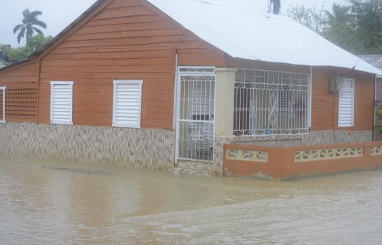Viviendas y miles de tareas agrícolas están inundadas en Villa Vásquez y Guayubín