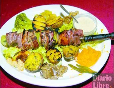 Vacas y el sabor de carnes preparadas a la parrilla