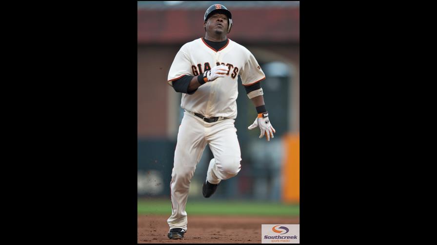 Juan Uribe de 4-2 en victoria de San Francisco