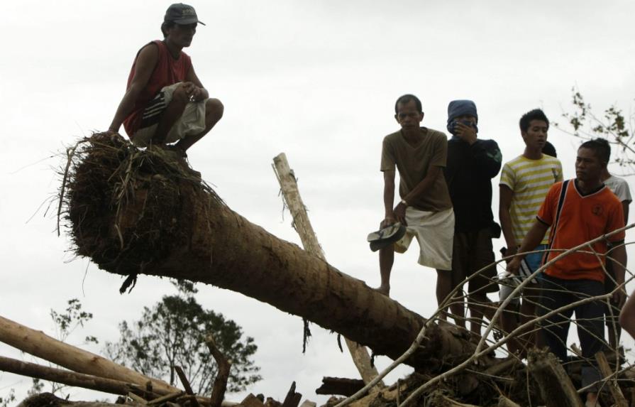 Al menos 456 Muertos y 5,4 millones de afectados por el tifón Bopha en Filipinas