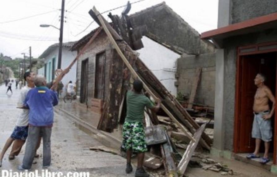 Sandy leaves 21 dead in its path across the Greater Caribbean