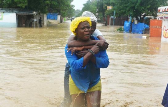 Ascienden a 40 los muertos por lluvias de Sandy en el Caribe; 26 en Haití