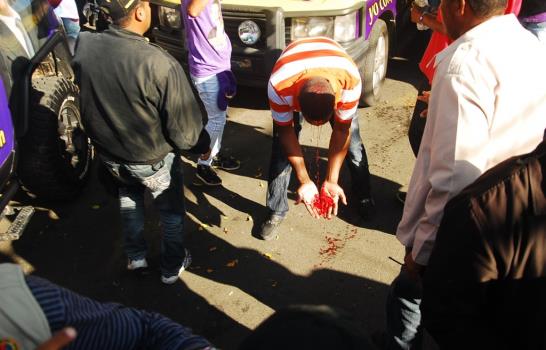 Policía dice botellazo no fue contra el Presidente