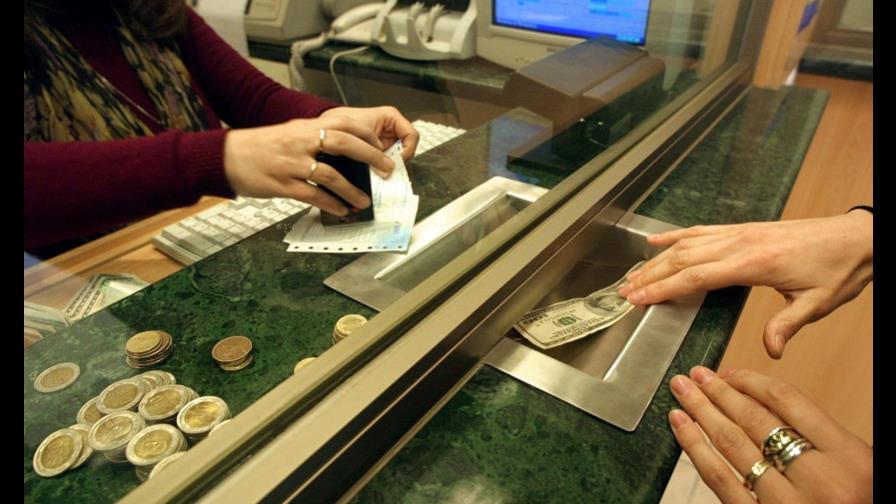 Peso dominicano se deprecia 0.02 % frente al dólar