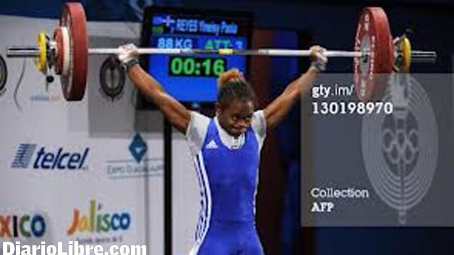 Una atleta de oro, plata y bronce Una atleta de oro, plata y bronce