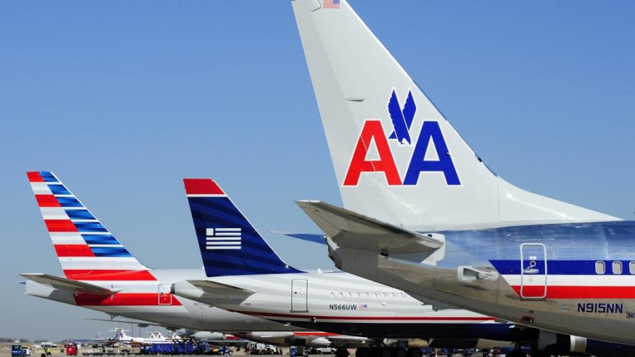 American y US Airways culminan su fusión y crean la mayor aerolínea del mundo American y US Airways culminan su fusión y crean la mayor aerolínea del mundo