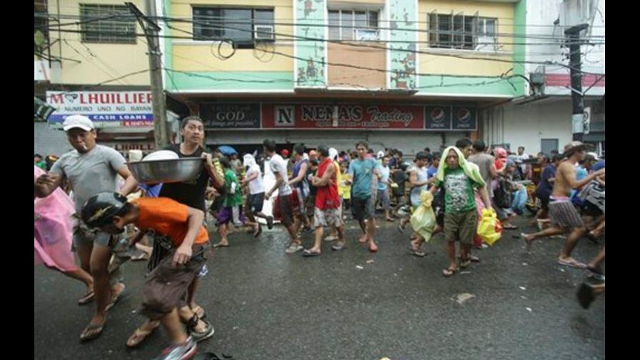 Filipinas: ocho muertos en saqueo de bodega de arroz Filipinas: ocho muertos en saqueo de bodega de arroz