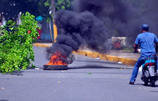 Aumenta a tres el número de muertos por balas en huelga del Cibao