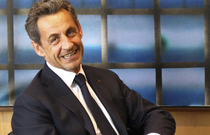 Sarkozy bromea con que no piensa instalarse en Bélgica como otros franceses