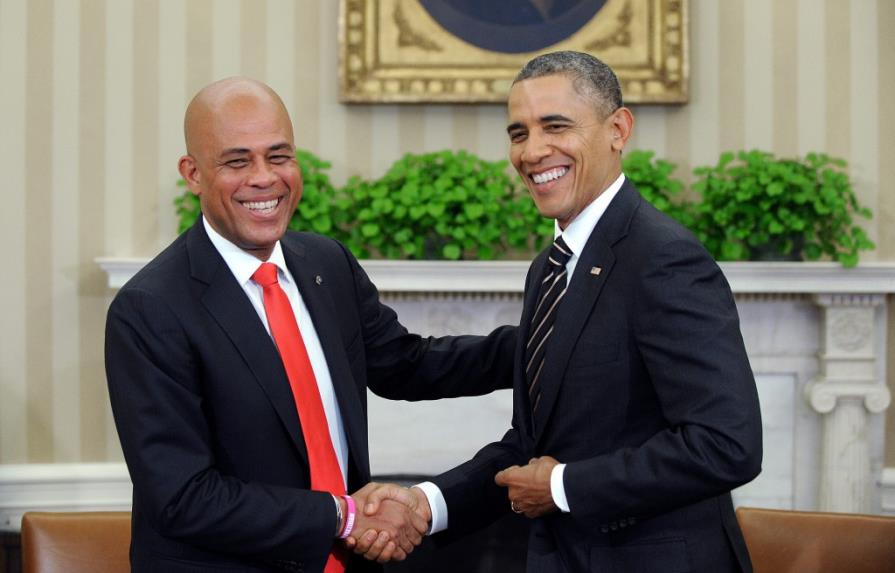 Obama está alentado por ley electoral en Haití y promete apoyo a reformas