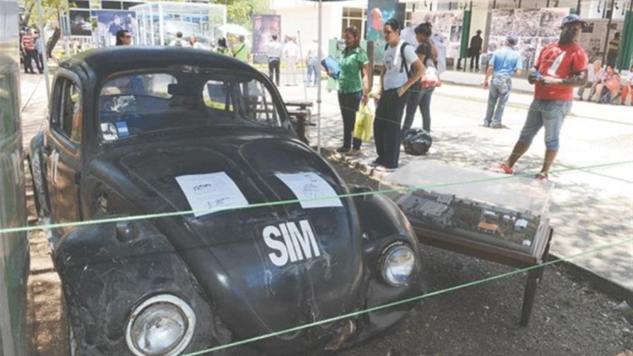 Los motoristas y los carritos cepillos del SIM Los motoristas y los carritos cepillos del SIM