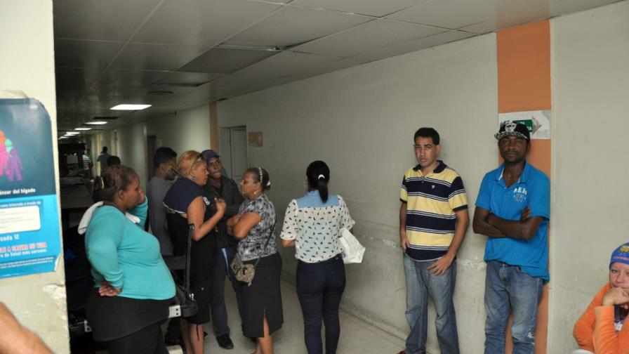 Encuentran a dos hombres acribillados en Santiago