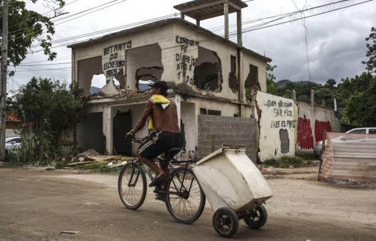 La favela olímpica denuncia presiones para aceptar el desahucio por Juegos