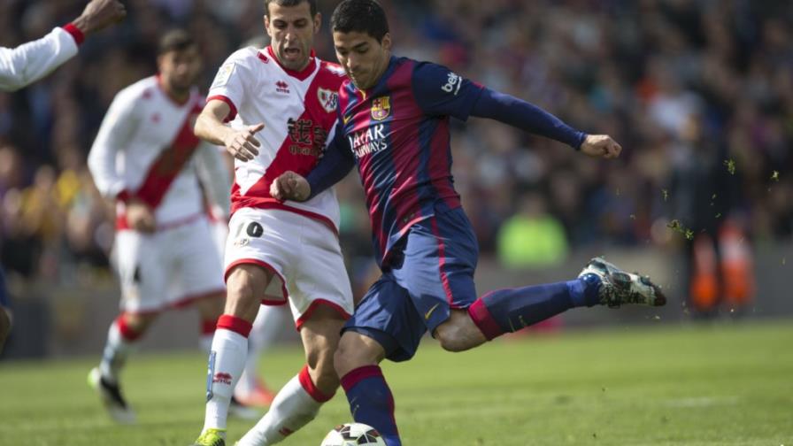 Messi y Suárez guían el liderato del Barsa