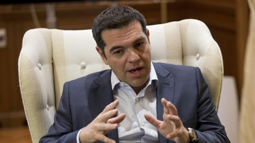 Tsipras pide solución global y afirma que la pelota está en manos de socios